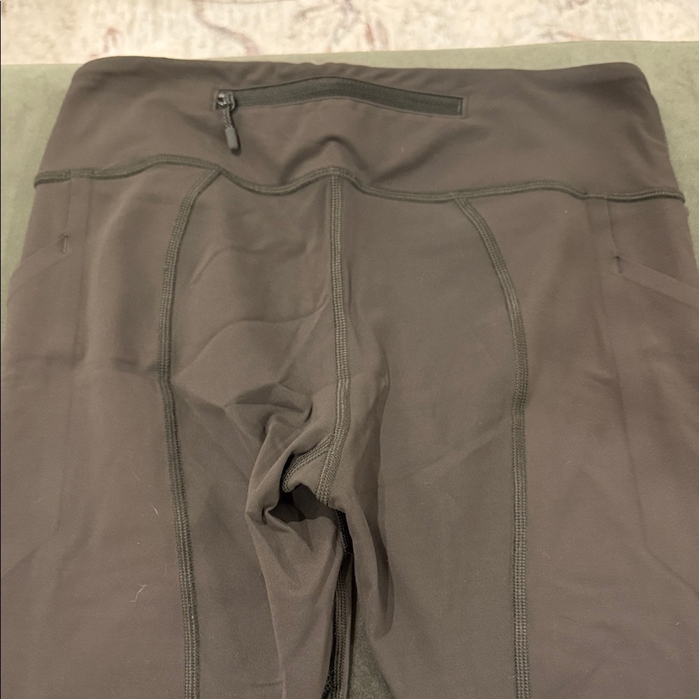 Size 4 olive green Lululemon cropped leggings